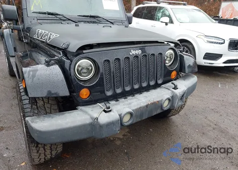 2007 Jeep Wrangler Unlimited Sahara z USA, uszkodzony, nr VIN 1J4GA59177L138495